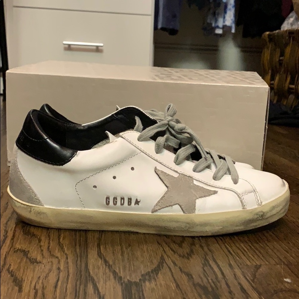 White w/neutral suede star and black leather heel
